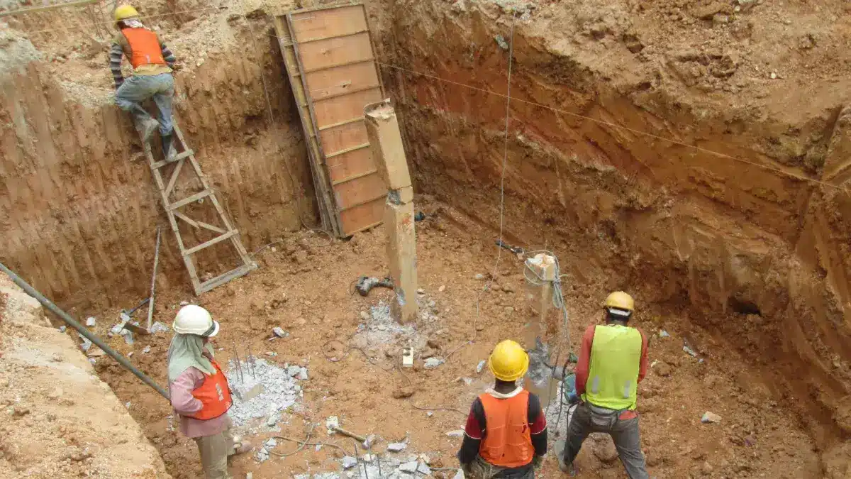 Shamrock crew working at the bottom of a large excavation in Idaho