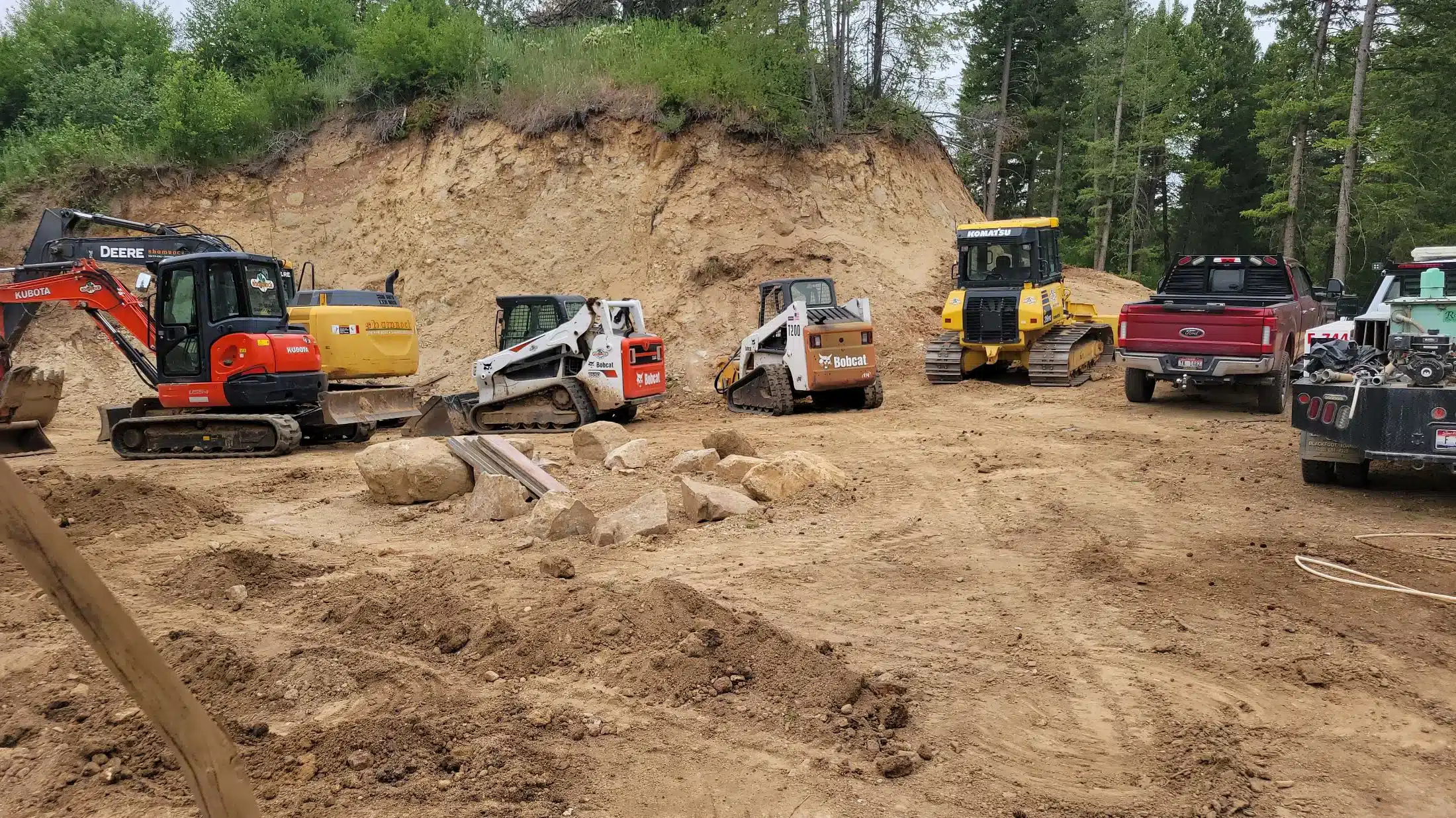 Excavator preparing a building site in a Boise neighborhood