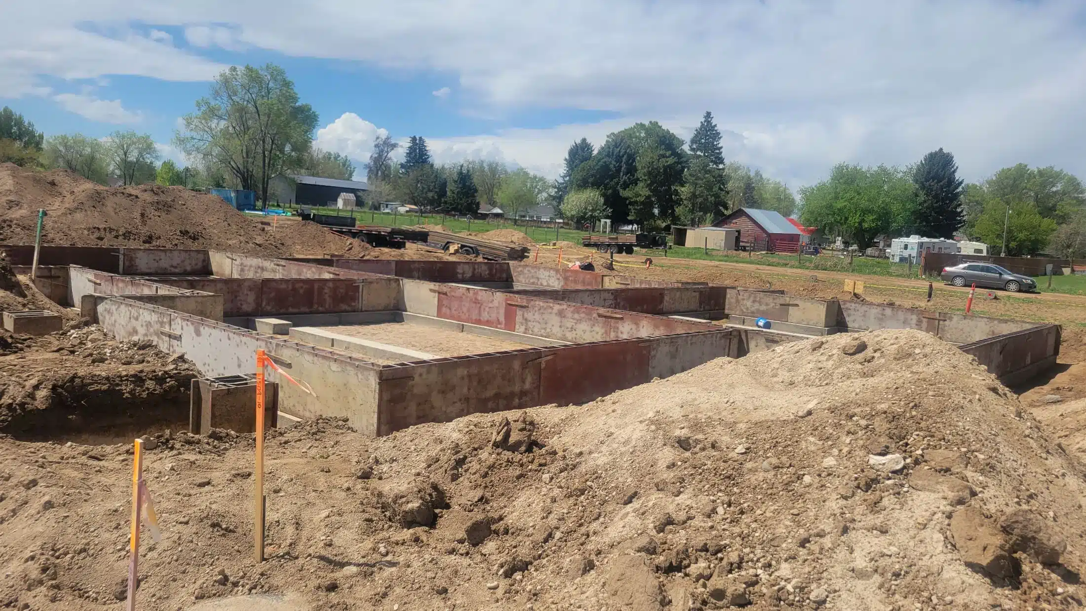 Excavator moving earth during site preparation in Boise, Idaho