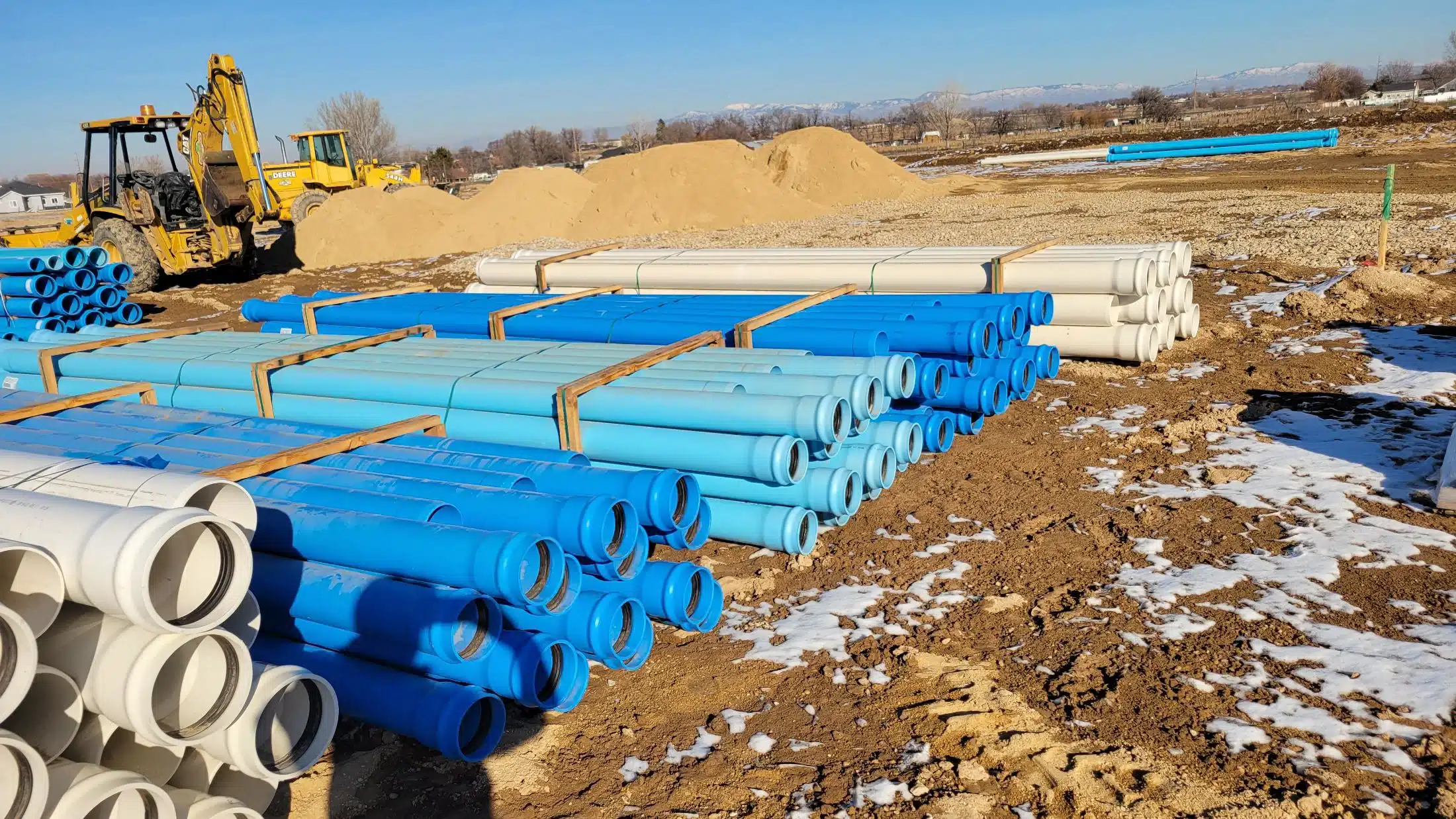 Water line excavation across a residential lot in Boise, Idaho