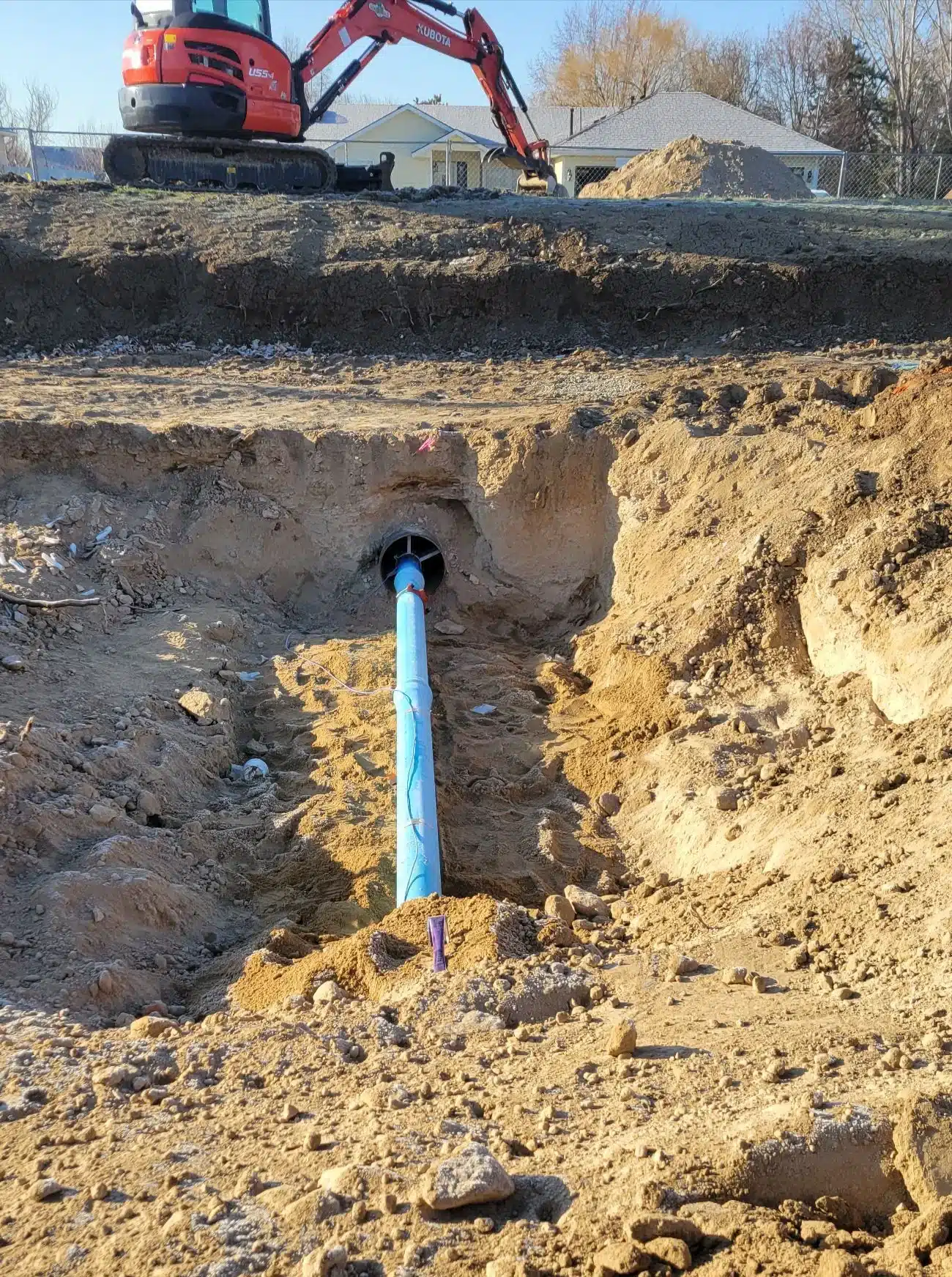 Water line repair excavation exposing a service line in the Treasure Valley