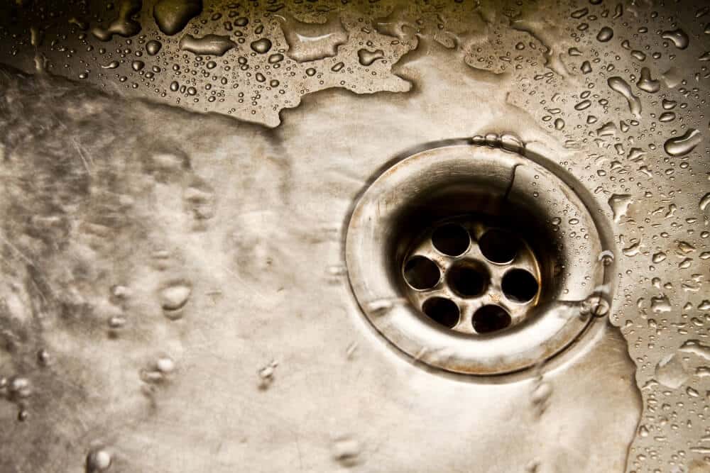 Slow draining sink signaling a sewer line problem in a Treasure Valley home